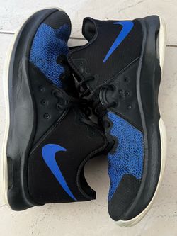 Blue Nike basketball ball sneakers