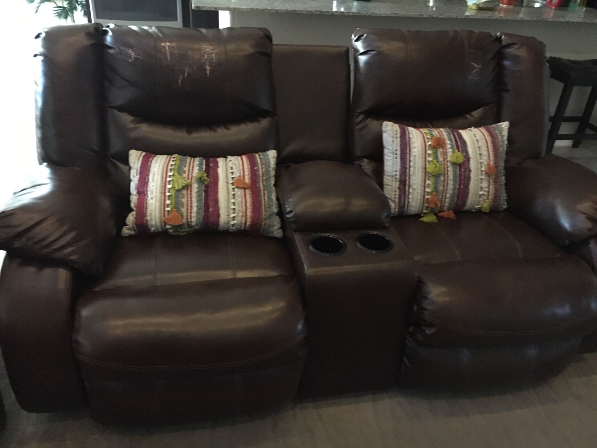Recliner two seater with cup holder and storage