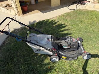 Craftsman Lawn Mower-One wheel needs maintenance before mowing.