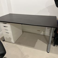 Desk with Outlet Plugs