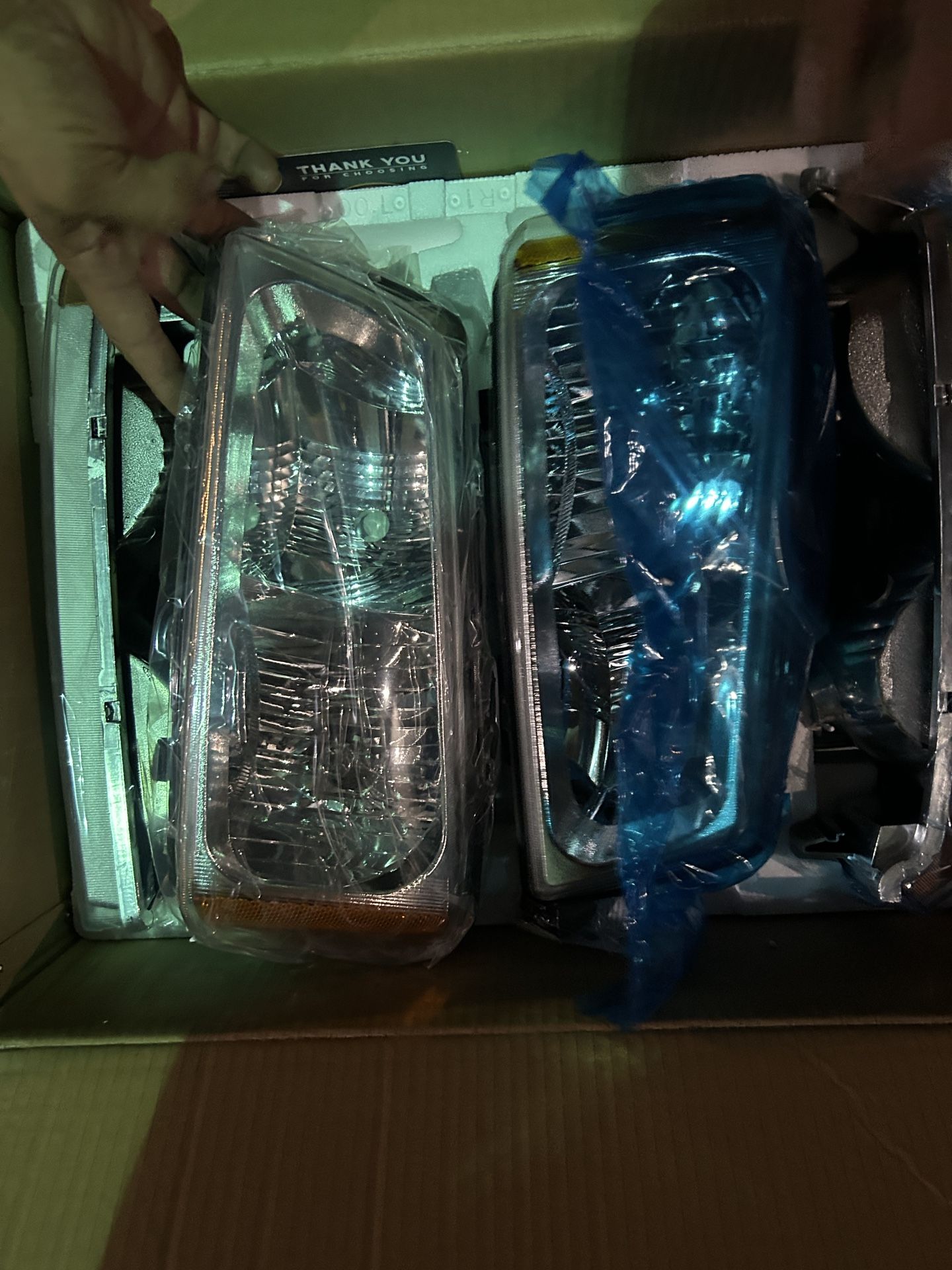 03-07 CHEVY HEADLIGHTS
