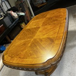 Elegant Carved Wood Dining Table – Classic Statement Piece