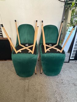 4 green chairs