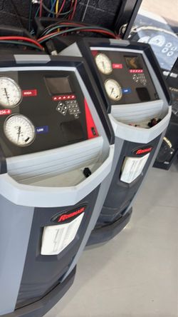AC automotive evac and recharge with profesional robin air machines.