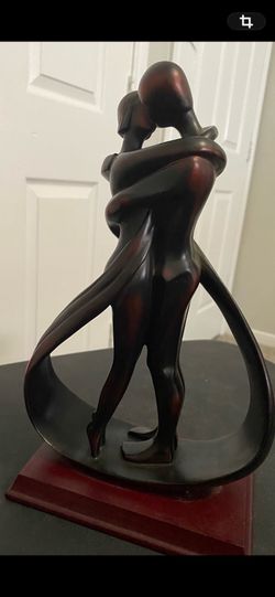 Wood carved Lovers entangled Statue