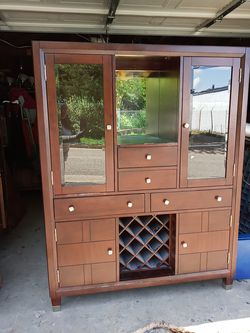 Beautiful china cabinet very unique $1,000 piece