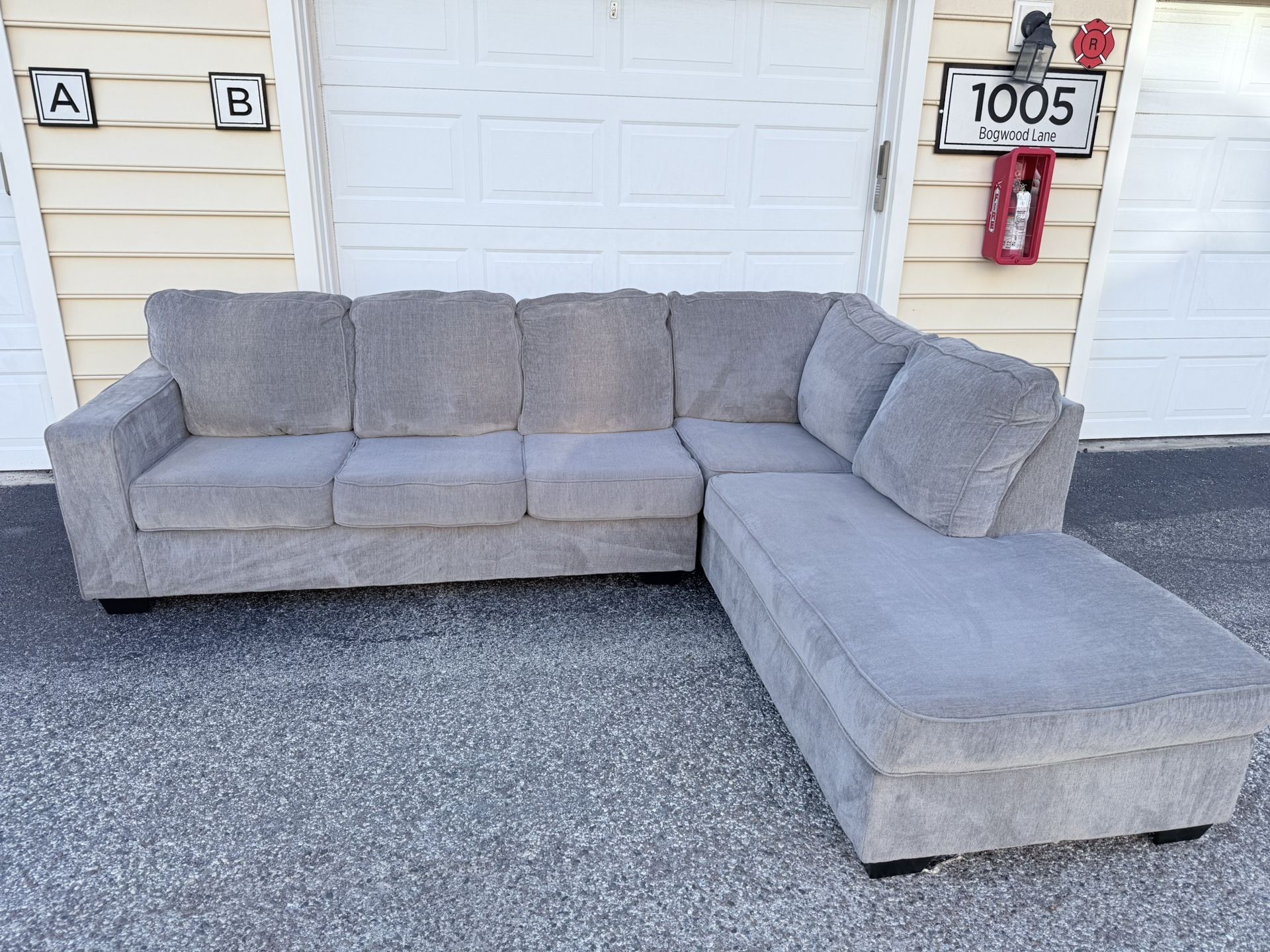 Modern gray sectional sofa – Deep cleaned & ready for a new home, Delivery Available