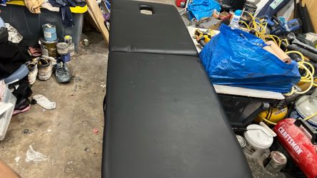 Massage table