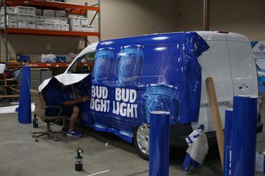 Wrap Your Vehicle remotely In An advertisement that pays you $400-$1500  weekly for BUD LIGHT Drink