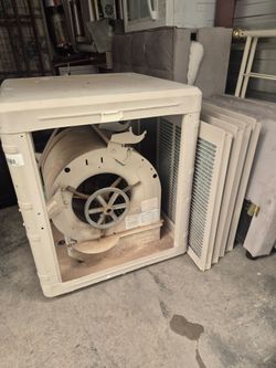 Downdraft swamp cooler