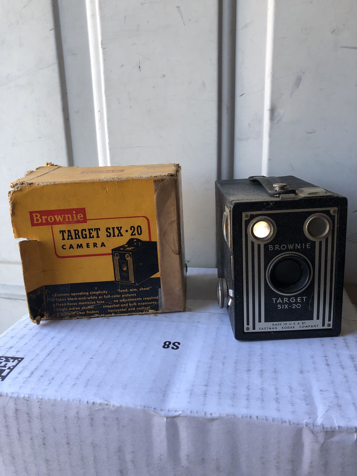 8 mm Argus Showmaster movie projector and screen.