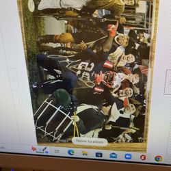 Malcolm Butler autographed picture with Patriots Minutemen