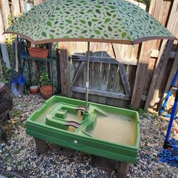 water and sand play center sand box with umbrella.