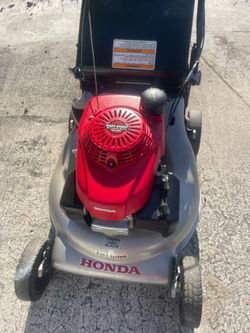 Lawn mower Honda with grass bags with speed control  double blades works perfect your commercial business