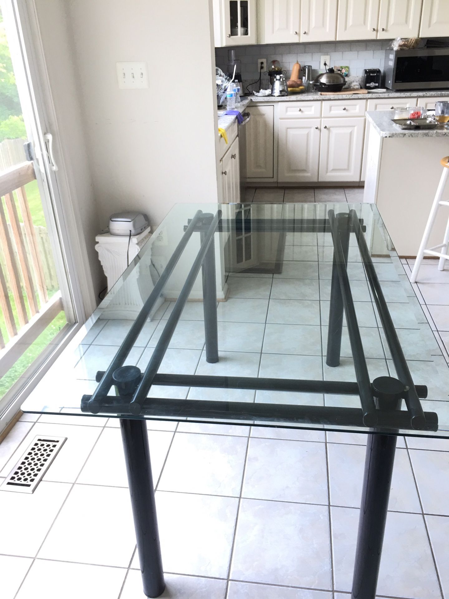 Glass top dining table