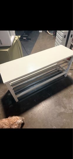 Very nice shoe rack like to put in the entrance it has a few scratches. It’s just paint scratch easy to fix asking $50.