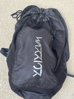 Black drawstring backpack with mesh panels for sports and gym equipment.  Excellent condition sleek and durable, the Black Men's Backpack is perfect f
