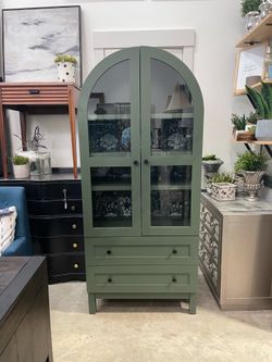 Green curved buffet, hutch or bookshelf