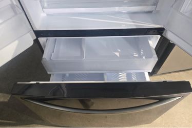 Like new LG black stainless counter depth 3-door French door refrigerator