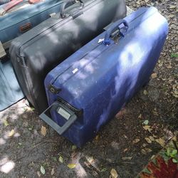 TWO PULL ALONG SUITCASES 