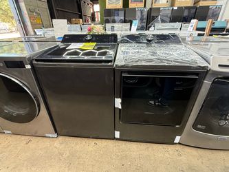 Brand new LG Stainless Steel top load washer and gas dryer set
