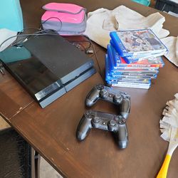 PS4, 2 Controllers, & 8 Games