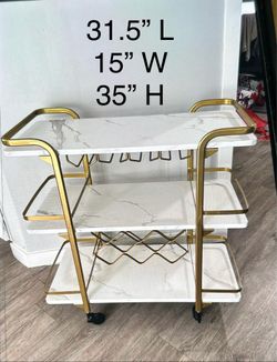 IMITATION MARBLE WHITE AND GOLDBAR CART WITH WHEELS AND BRAKES