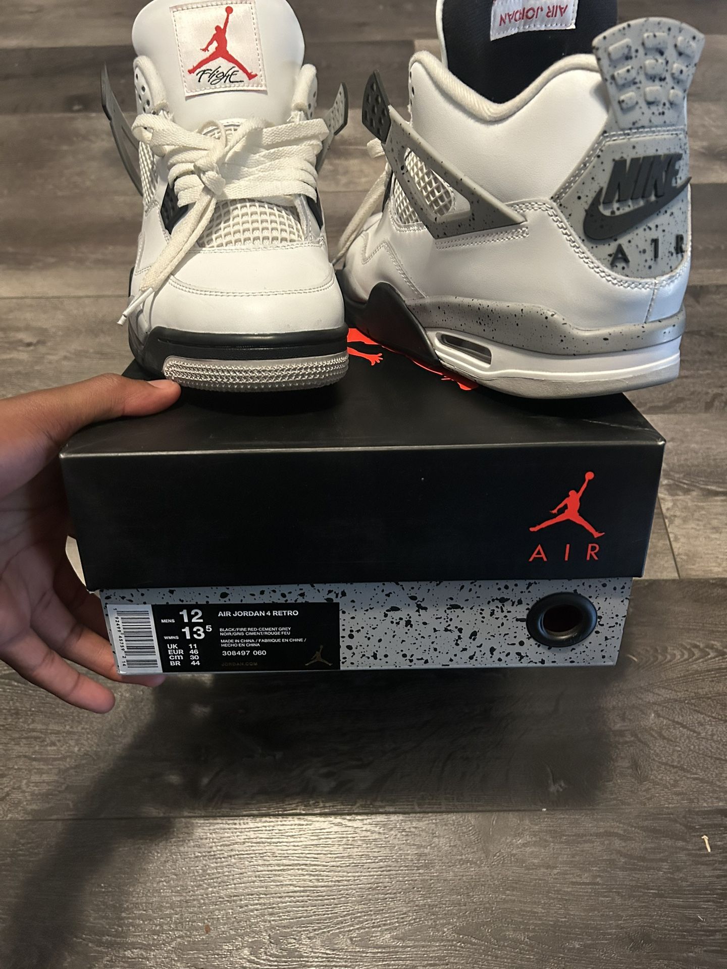 white cements jordan 4s