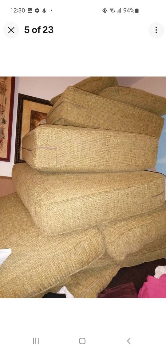 A Whole Set Of Sofa Cushions And Pillows