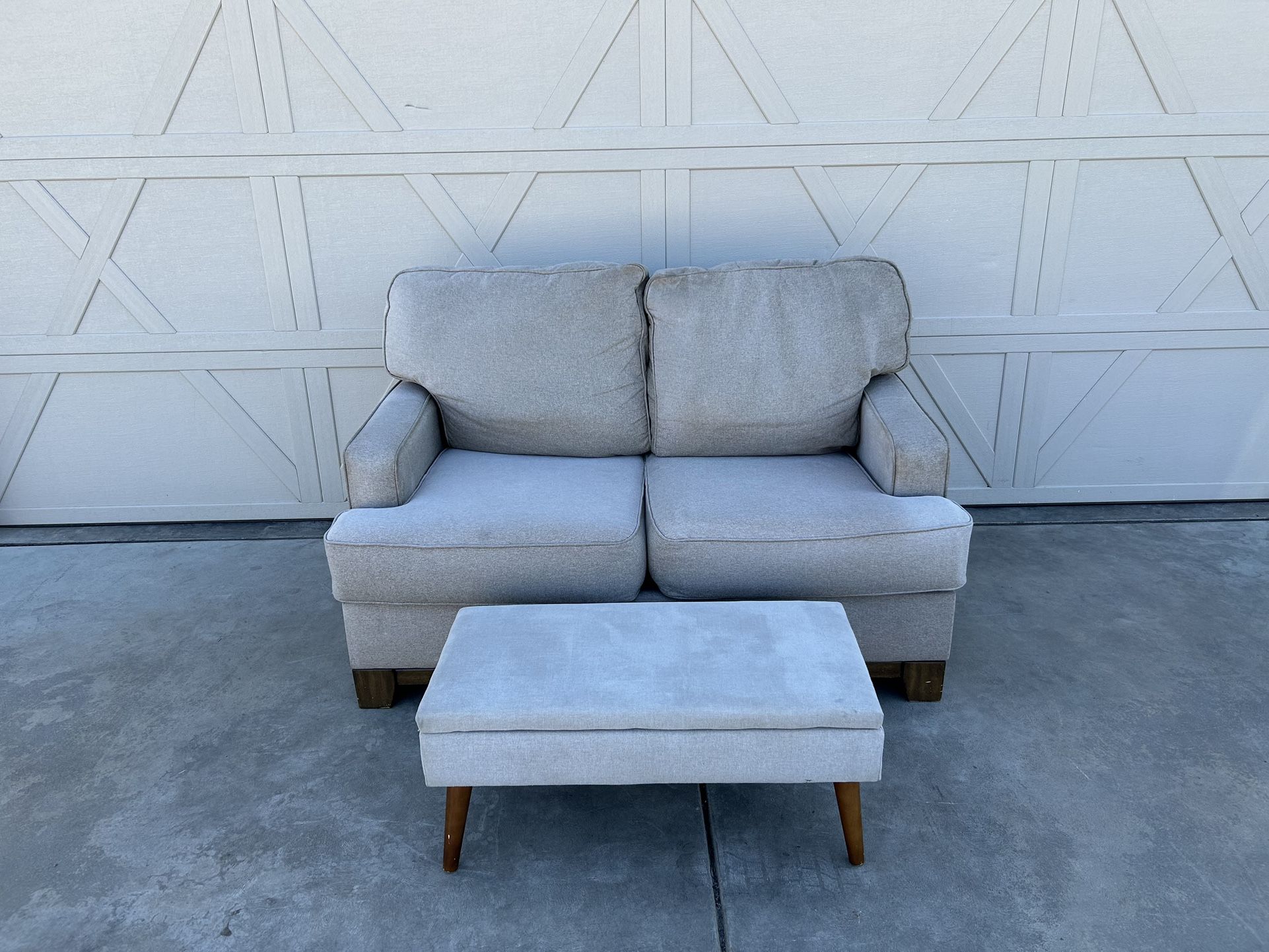 Light Grey Loveseat And Ottoman