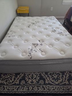 Queen Mattress (almost new)