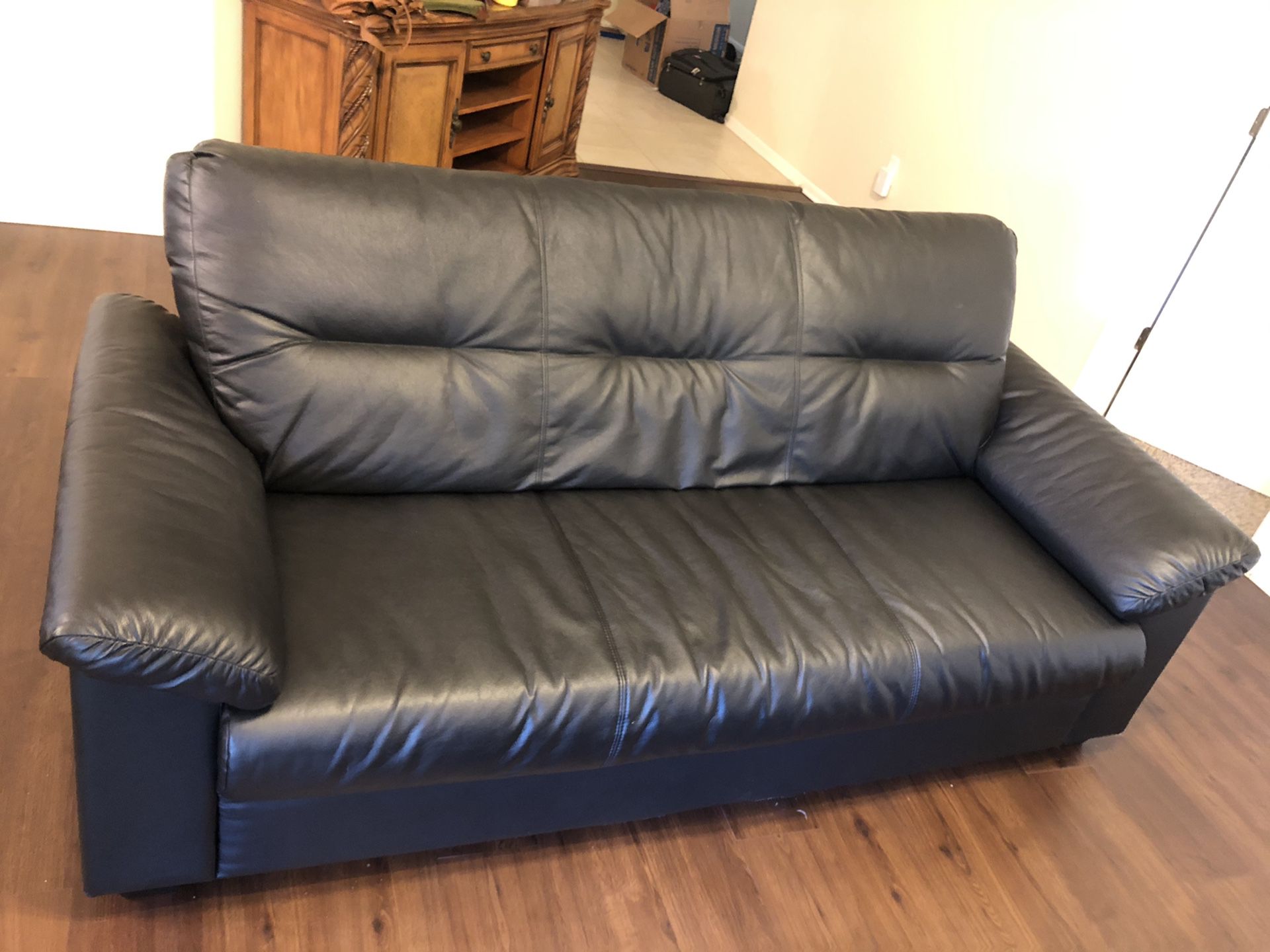 Black leather sofa couch
