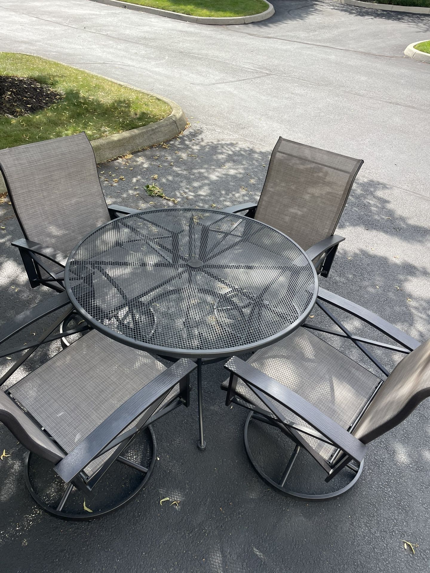 42 Inch Round Wrought Iron Table & 4 Swivel Rocker Chairs