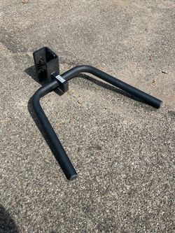 Hammer strength dip station attachment