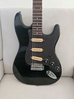 Black strat guitar roadworn
