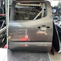 2016 - 2023 TOYOTA TACOMA - REAR DRIVER SIDE DOOR SHELL OEM 