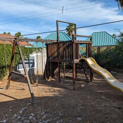 Swing set With Slide And Rock Wall
