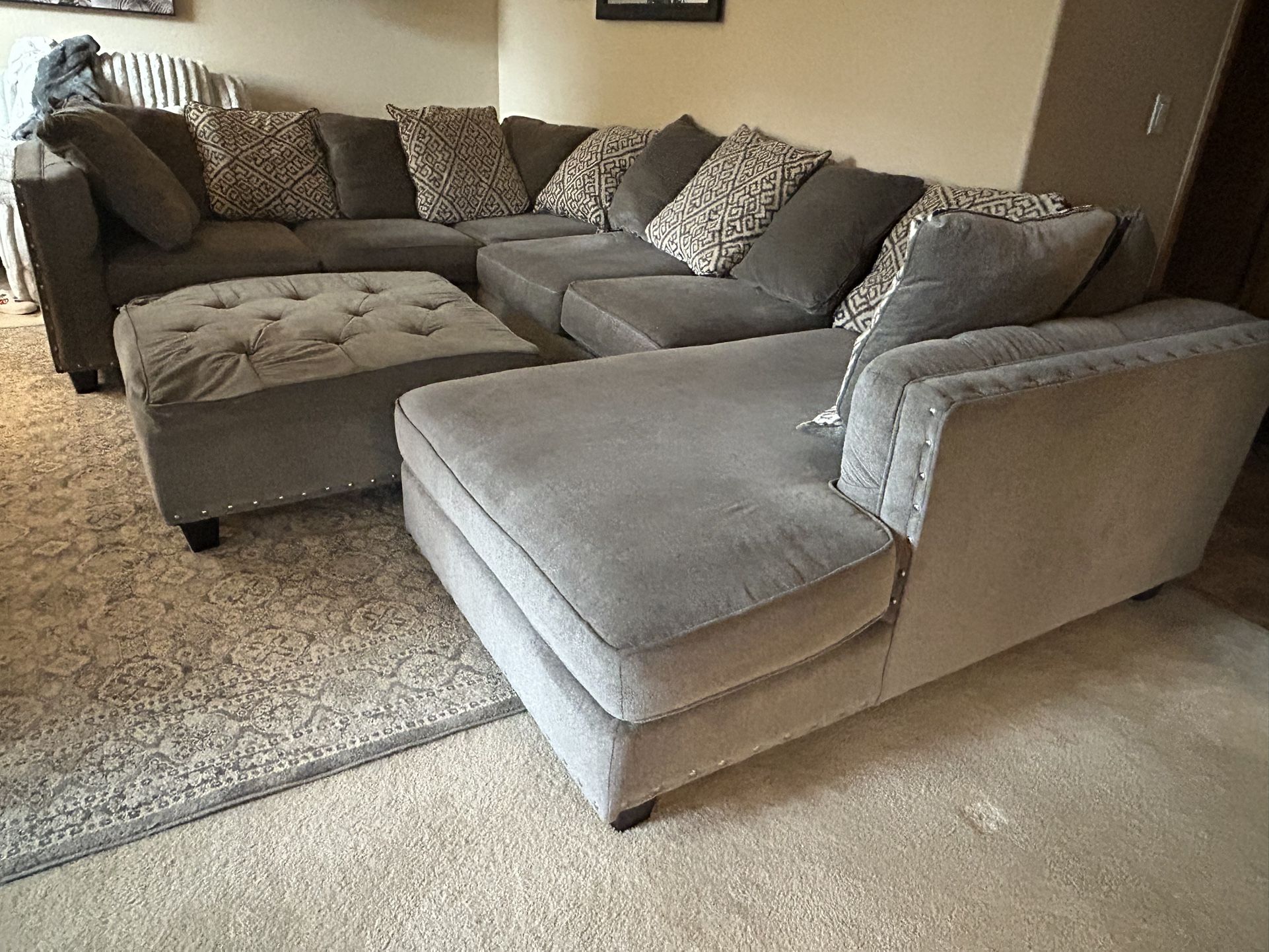 Gray Sectional With Ottoman
