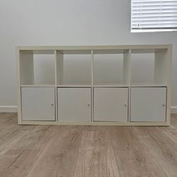 IKEA kallax with inserts with doors.