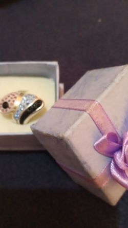 Pink, black and blue ring