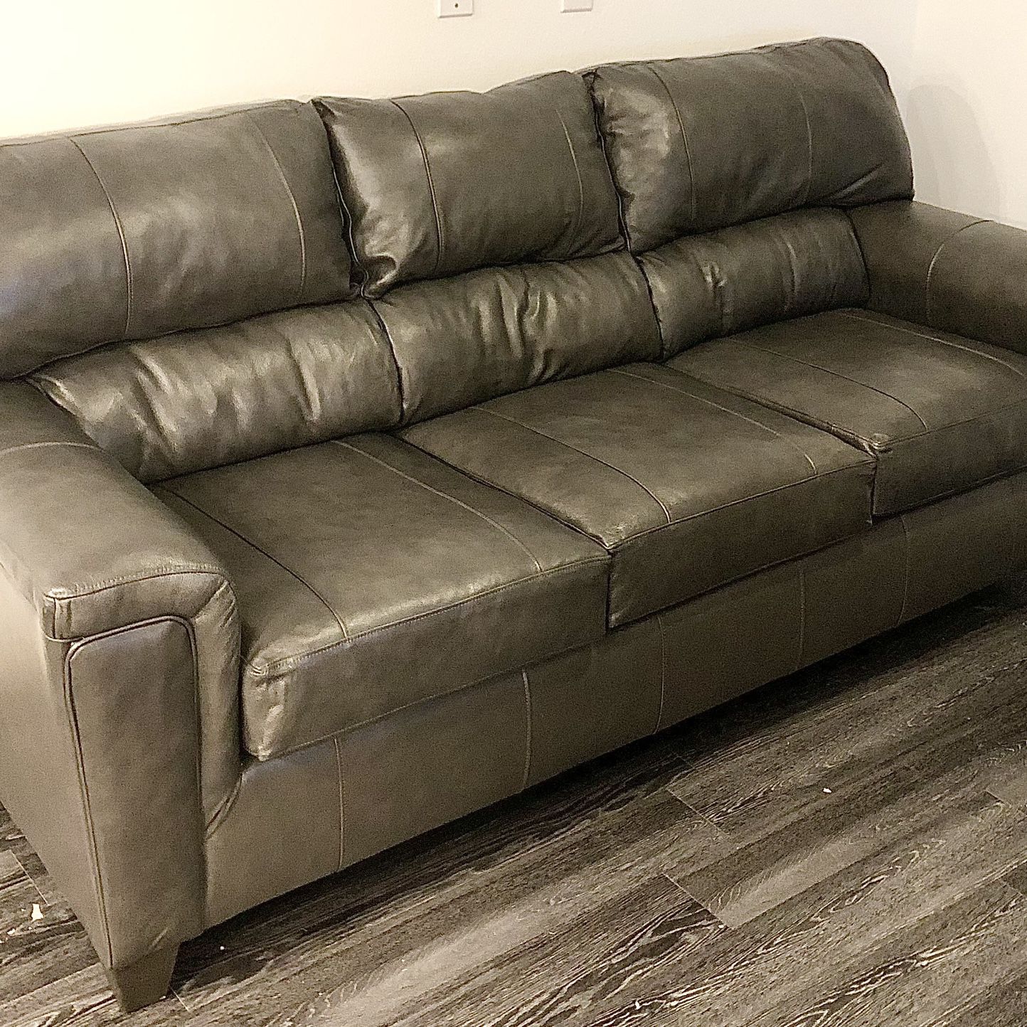 Gray leather couch from Nebraska Furniture $600 OBO!!!