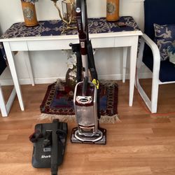 Shark vacuum cleaner, new model never new section all the attachment is include works perfect excellent condition