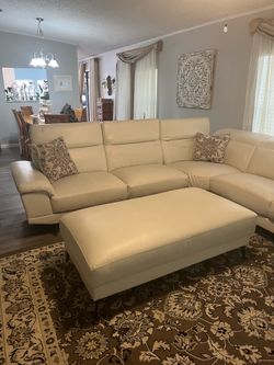 Beautiful sectional and ottoman $100 OBO must pick up by Sunday