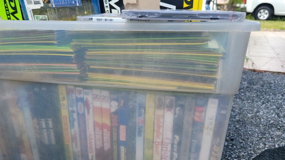 Approximately 500 DVD's packaged with prices on them ready to be sold somewhere
