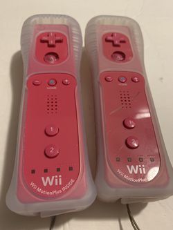 nintendo wii controllers pink