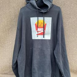 Nike Sportswear Club Fleece Pullover Hoodie in black with a waffle fries graphic