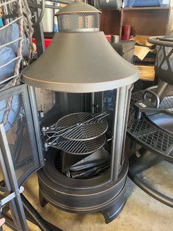 Metal chimenea fire pit with grill