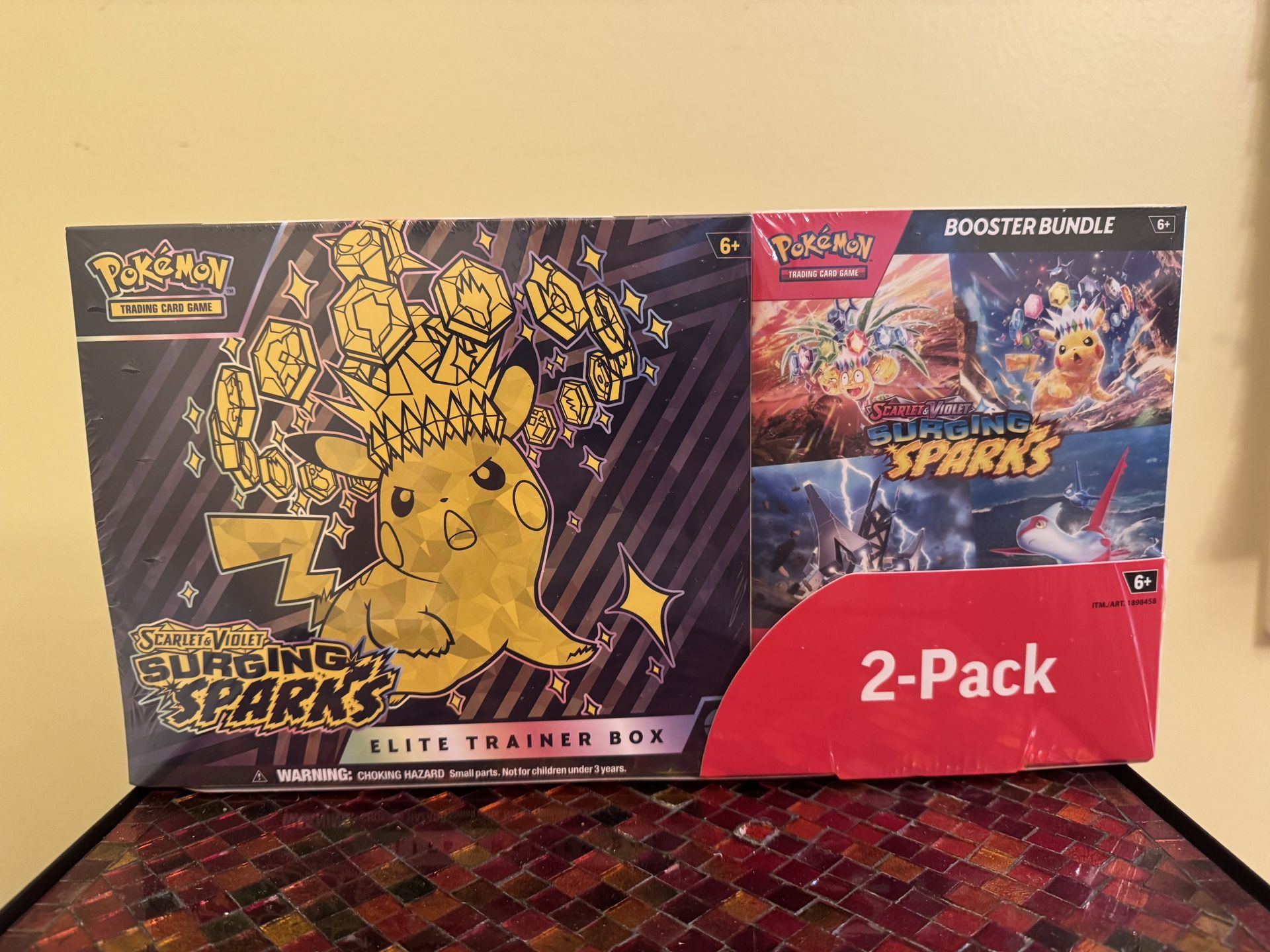 surging sparks booster box elite trainer box Amazon.com: Pokémon TCG: Scarlet & Violet main image 0