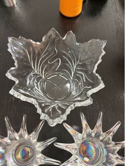 Vintage glassware set includes two candle holders and a decorative fruit bowl.