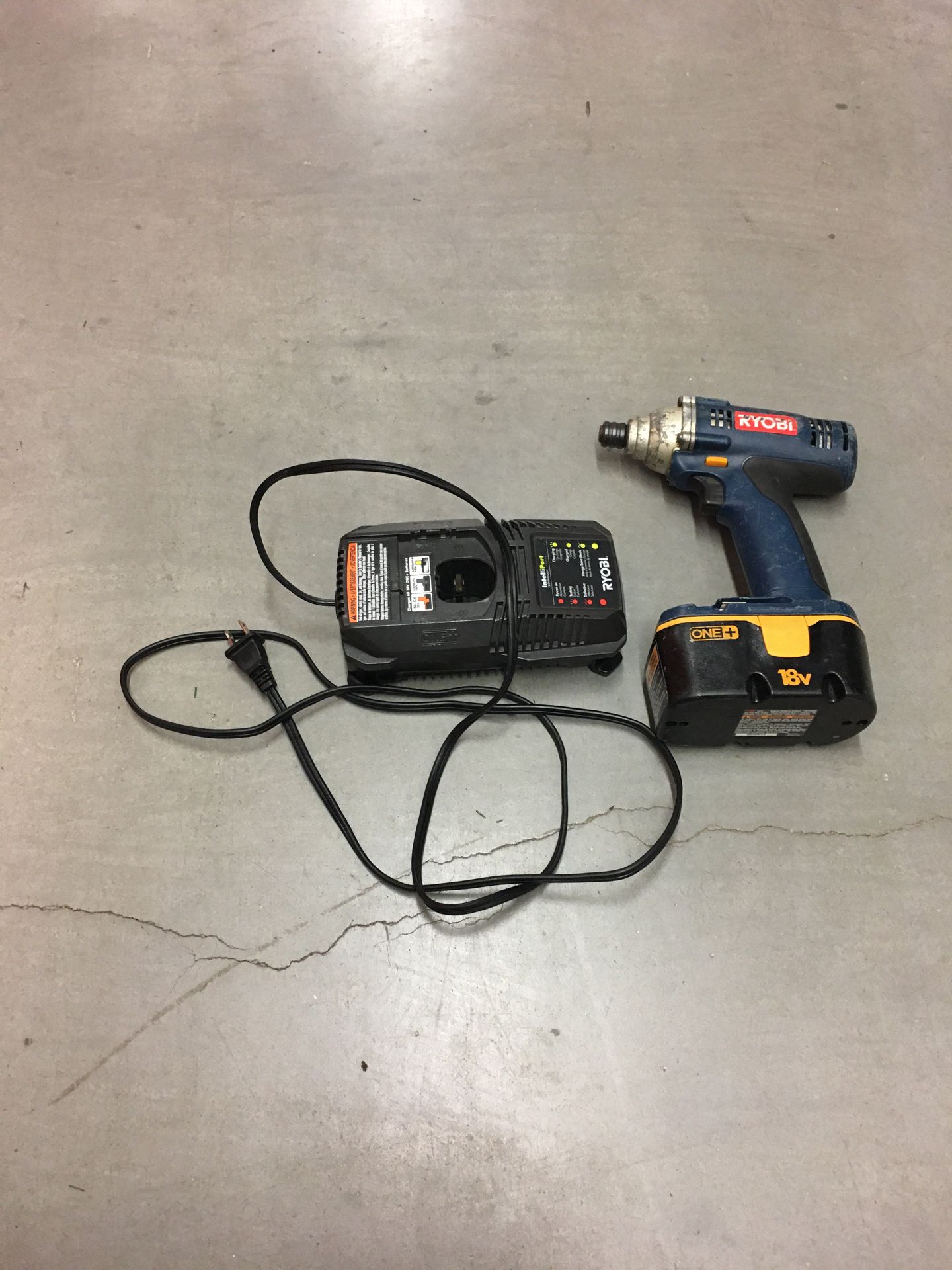 Ryobi tools impact drill and charger and battery